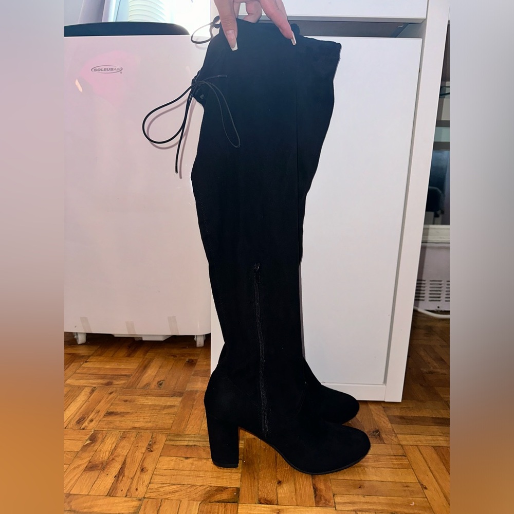 Black knee high boot
